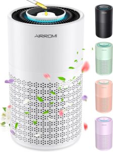 Air purifiers in various colors with floral design elements.