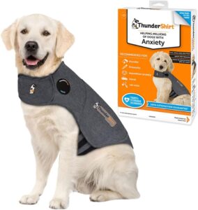 Dog wearing anxiety relief ThunderShirt with packaging.