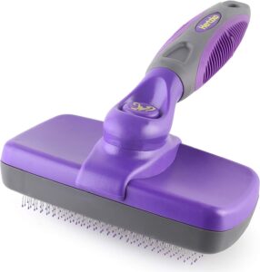 Purple pet deshedding grooming brush.